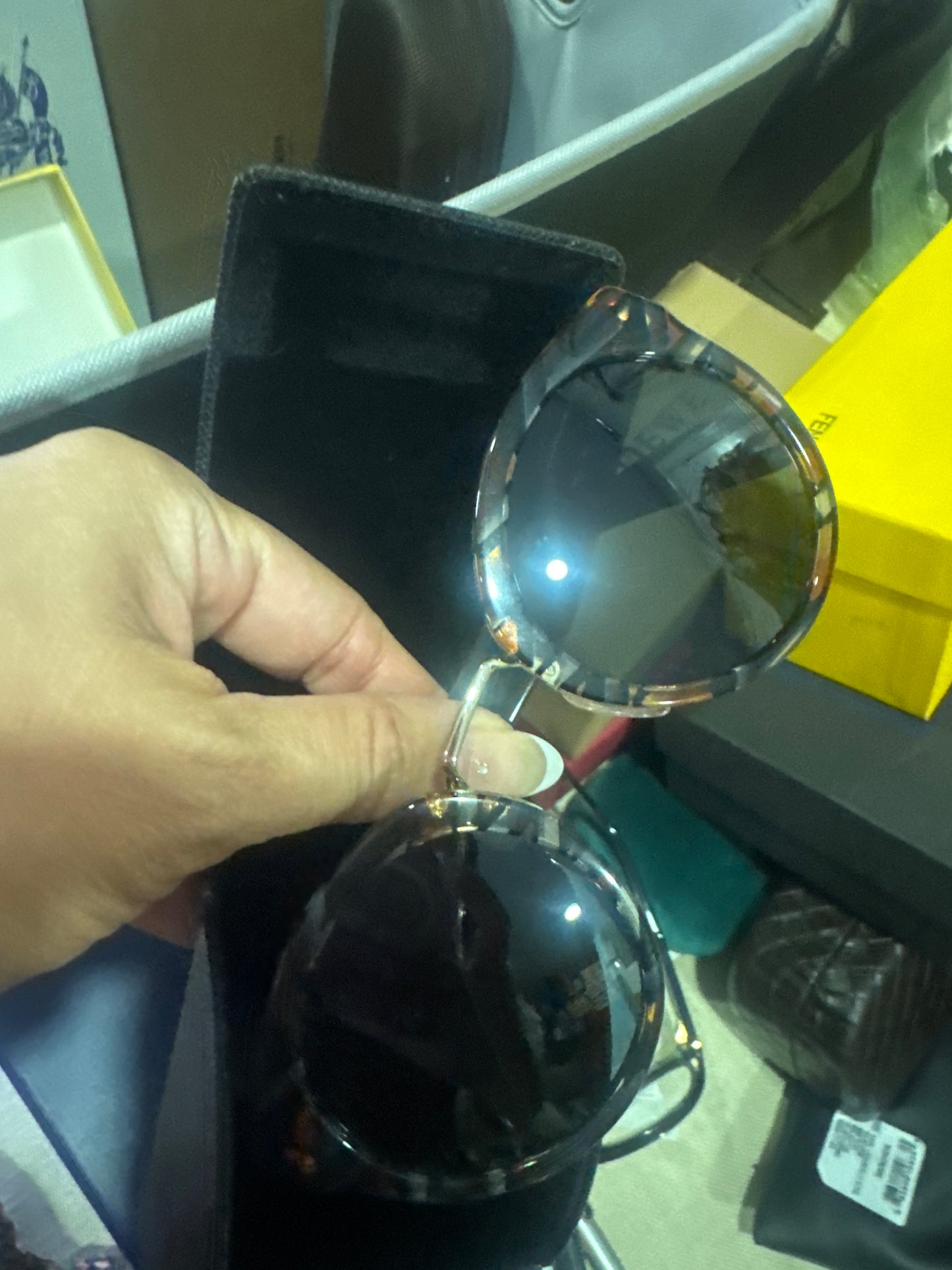 LV sunglasses plus Prada