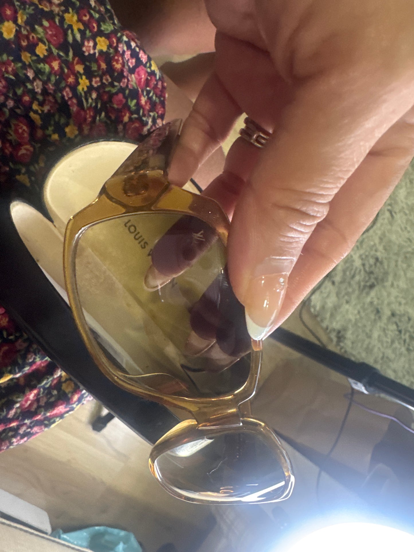 LV sunglasses plus Prada